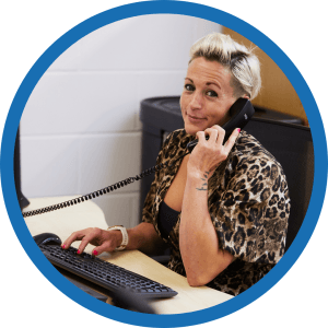 Nicky Davies answering calls in house