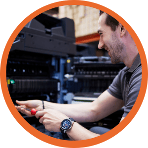 a service engineer servicing a device